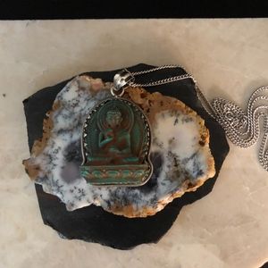 buddha pendant with silver chain